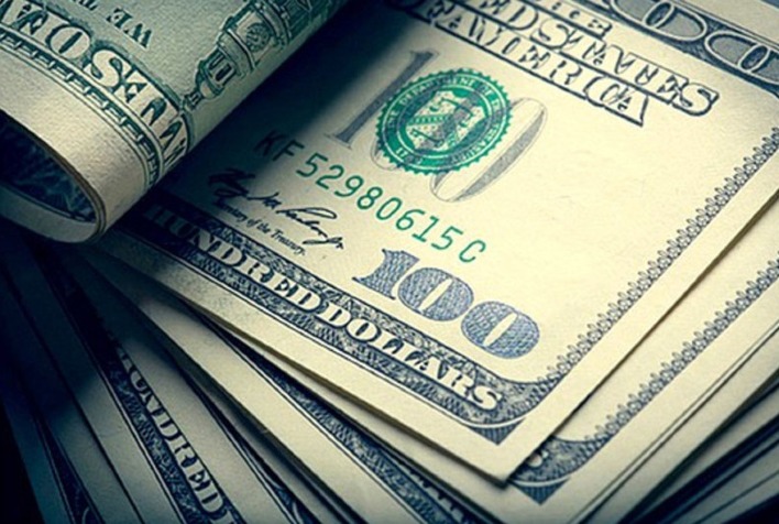 Dólar tem viés de queda com alívio externo e expectativa por decisões de política monetária